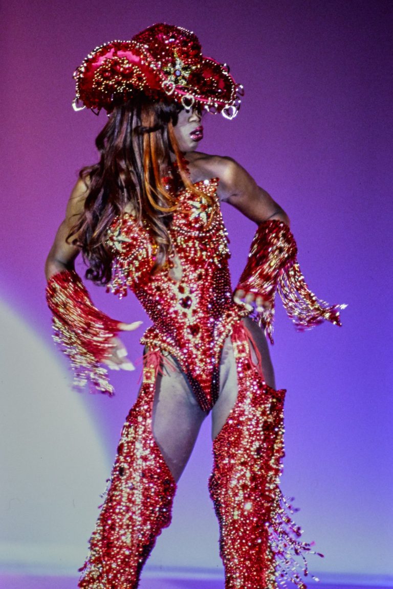 Thierry Mugler Cowgirl in Red Jeweled Cowboy Hat and Outfit - PROVOKR